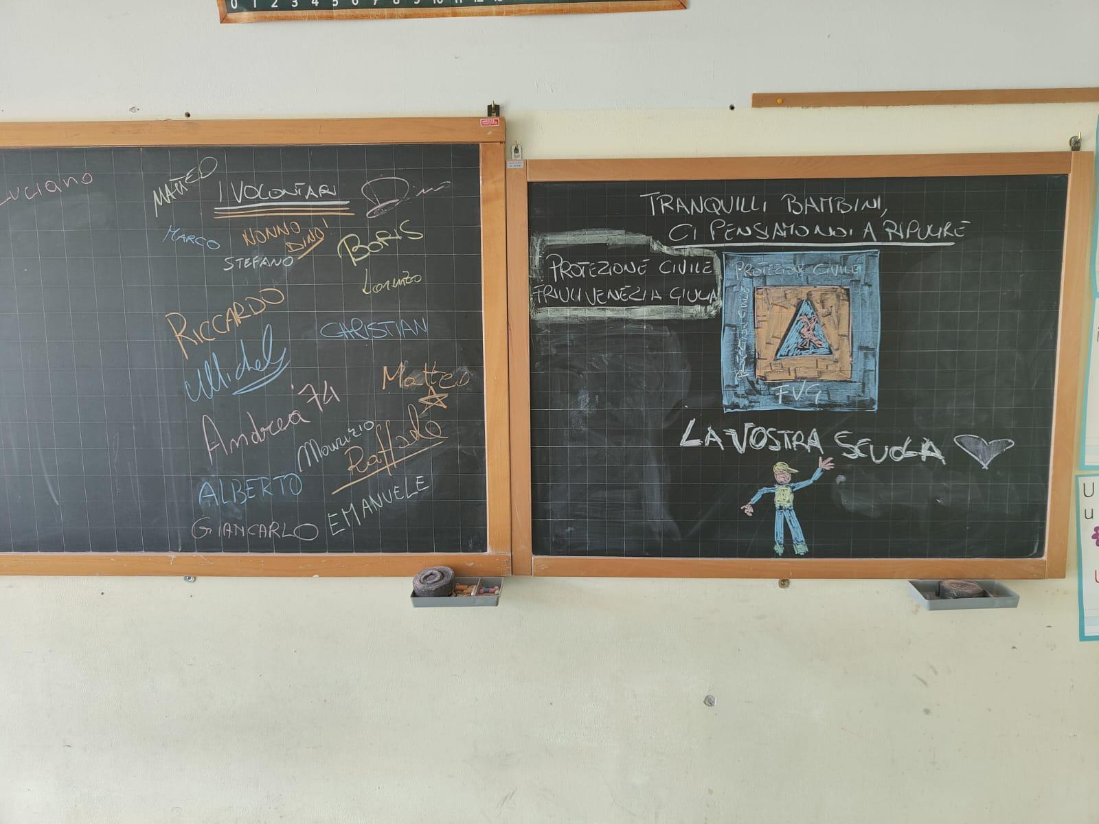 Copertina per La scuola di Forlì ripulita dai volontari Fvg, doni e disegni dai bambini